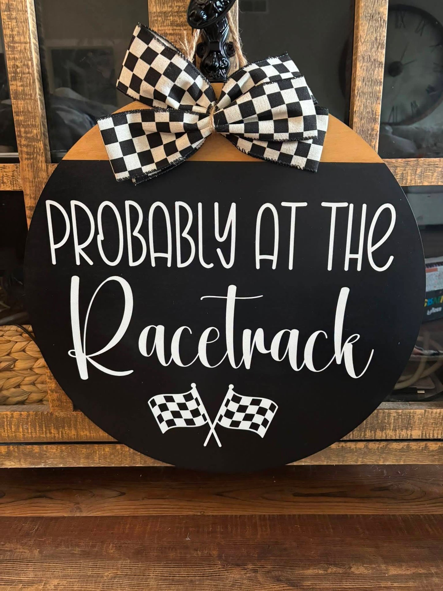 Probably at the Racetrack Sign
